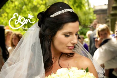 Close up of brides face looking downwards