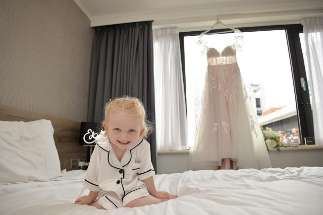 Happy 3rd birthday to this little cutie Dolly! I met her and shot this photo while she was jumping round the bridal suite at the @crownplazaliverpool last summer when I shot her mum and dad’s wedding day photos. It was hard to keep her still and get some nice smiley shots but I managed to get a few in the end between the jumps 🤣😅 and this one is my favourite with her mums beautiful wedding dress behind. 😍
Hope you and Dolly had the best day yesterday, @laura___mason 🧸🎀🎈🎂 xx

#weddingphotographyliverpool
#familyphotographyliverpool
#babyphotographerliverpool
#babyphotographyliverpool